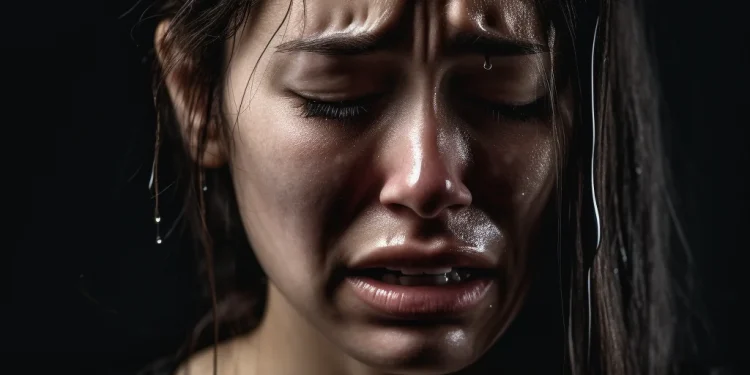 A woman was tied naked to a pole because of her son’s affair.